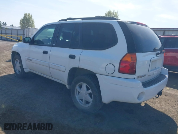 2003 GMC Envoy SLT with VIN 1GKDT13S232394707, listed as a IAAI auction lot 42084139 with 192,416 mi miles. Bid and sale history available at carsss.com. Image 3.