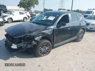 2020 Mazda CX-5 Touring with VIN JM3KFACM2L0770241, listed as a IAAI auction lot 42186952 with 41,590 mi miles and . Bid and sale history available at DreamBid. Image 18.