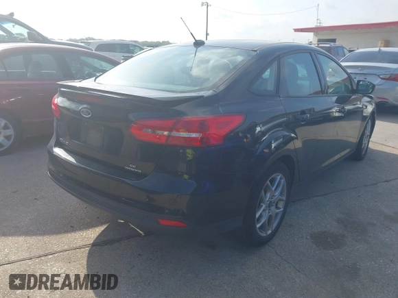 2015 Ford Focus SE with VIN 1FADP3F29FL384591, listed as a IAAI auction lot 42537981 with 49,735 mi miles and . Bid and sale history available at DreamBid. Image 4.