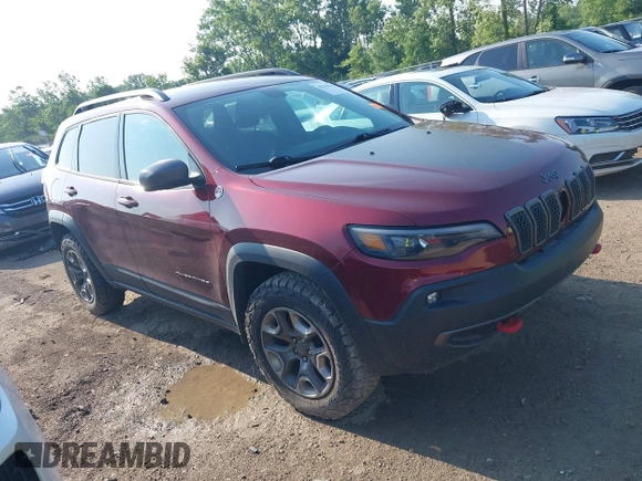 2019 Jeep Cherokee Trailhawk with VIN 1C4PJMBX5KD421043, listed as a IAAI auction lot 42570336 with 114,463 mi miles and . Bid and sale history available at DreamBid. Image 1.