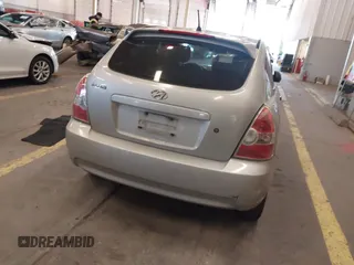 2008 Hyundai Accent GS with VIN KMHCM36C78U066341, listed as a IAAI auction lot 41377961 with 354,357 mi miles. Bid and sale history available at carsss.com. Image 16.