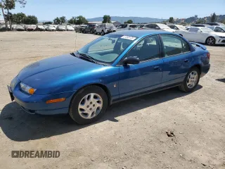 2000 Saturn SL z VIN 1G8ZK5271YZ184701, wystawiony jako Copart lot #61598135 z przebiegiem 123 309 mil mil oraz Szkoda całkowita • Salvage title. Historia ofert i sprzedaży dostępna na DreamBid. Obrazek 1.