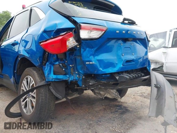 2021 Ford Escape SEL z VIN 1FMCU9H6XMUA63812, wystawiony jako IAAI lot #42418390 z przebiegiem 88 263 mil mil oraz . Historia ofert i sprzedaży dostępna na DreamBid. Obrazek 6.