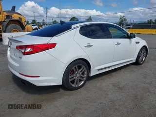 2013 Kia Optima SX with VIN 5XXGR4A65DG194141, listed as a IAAI auction lot 42261444 with 167,918 mi miles and . Bid and sale history available at DreamBid. Image 4.