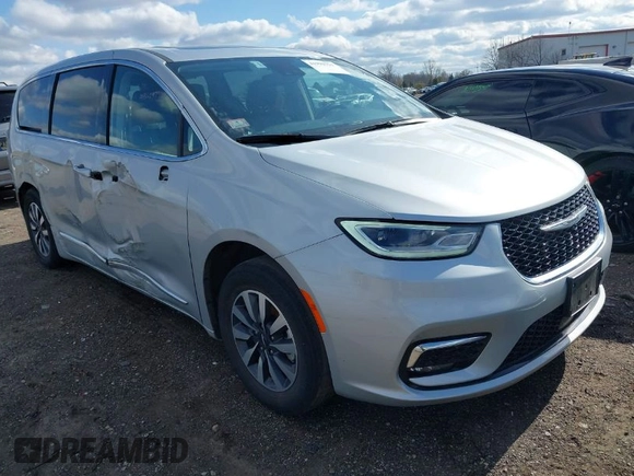 2023 Chrysler Pacifica Hybrid Limited with VIN 2C4RC1S78PR551260, listed as a IAAI auction lot 41992752 with 55,136 mi miles and . Bid and sale history available at DreamBid. Image 1.