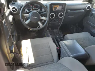 2008 Jeep Wrangler Unlimited Sahara with VIN 1J4GA59178L501668, listed as a Copart auction lot 63586375 with 213,562 mi miles and Clean title. Bid and sale history available at DreamBid. Image 8.