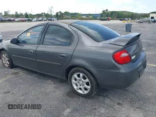 2003 Dodge Neon SXT z VIN 1B3ES56C43D247003, wystawiony jako IAAI lot #42111917 z przebiegiem 115 107 mil mil oraz . Historia ofert i sprzedaży dostępna na DreamBid. Obrazek 3.