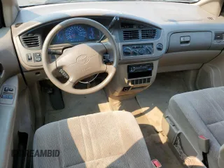 2001 Toyota Sienna CE with VIN 4T3ZF19C11U412899, listed as a Copart auction lot 70303244 with 190,025 mi miles and Salvage Title. Bid and sale history available at carsss.com. Image 8.