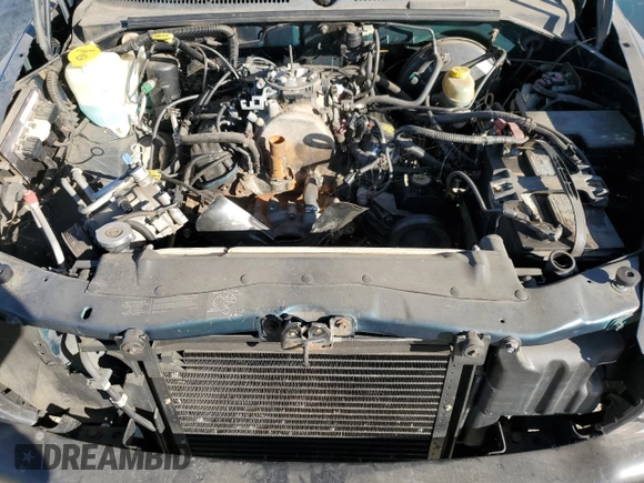 1998 Dodge Dakota SLT z VIN 1B7FL26XXWS656706, wystawiony jako Copart lot #75295904 z przebiegiem 89 796 mil mil oraz Szkoda całkowita • Salvage title. Historia ofert i sprzedaży dostępna na DreamBid. Obrazek 11.