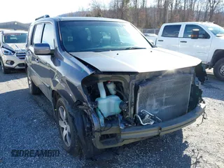 2014 Honda Pilot Touring with VIN 5FNYF4H95EB019048, listed as a IAAI auction lot 41526958 with 172,252 mi miles and . Bid and sale history available at DreamBid. Image 6.