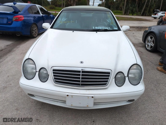 2000 Mercedes-Benz CLK-Class with VIN WDBLK70G2YT034673, listed as a Copart auction lot 74668434 with 0 mi miles and Salvage Title. Bid and sale history available at carsss.com. Image 5.