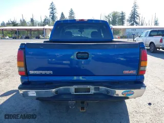 2004 GMC Sierra 1500 Crew Cab SLE with VIN 2GTEK13TX41394077, listed as a IAAI auction lot 42047304 with 227,296 mi miles. Bid and sale history available at carsss.com. Image 16.