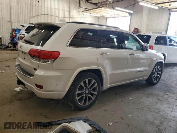 2017 Jeep Grand Cherokee Overland z VIN 1C4RJFCG8HC809868, wystawiony jako Copart lot #64056155 z przebiegiem 54 136 mil mil oraz Szkoda całkowita • Salvage title. Historia ofert i sprzedaży dostępna na DreamBid. Obrazek 3.