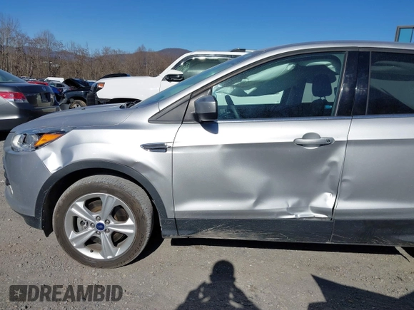 2014 Ford Escape SE with VIN 1FMCU9G95EUE49423, listed as a IAAI auction lot 41792045 with 56,733 mi miles and . Bid and sale history available at carsss.com. Image 12.