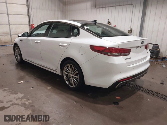 2016 Kia Optima SXL Turbo with VIN 5XXGV4L21GG073147, listed as a IAAI auction lot 41504517 with 130,467 mi miles. Bid and sale history available at carsss.com. Image 3.