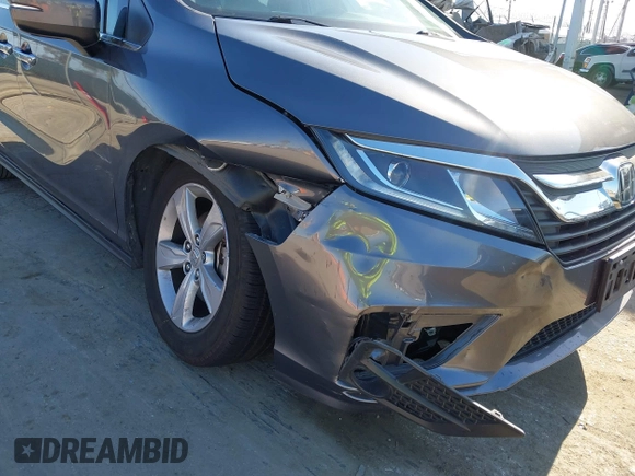 2018 Honda Odyssey EX with VIN 5FNRL6H53JB099188, listed as a IAAI auction lot 42239774 with 90,469 mi miles and . Bid and sale history available at DreamBid. Image 6.