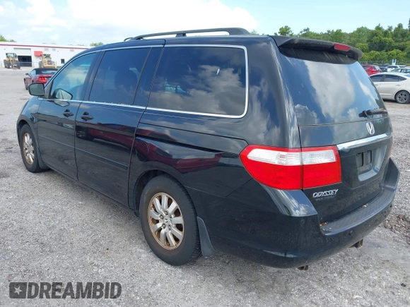 2007 Honda Odyssey Touring z VIN 5FNRL38827B059573, wystawiony jako IAAI lot #42261125 z przebiegiem 214 954 mil mil oraz . Historia ofert i sprzedaży dostępna na DreamBid. Obrazek 3.