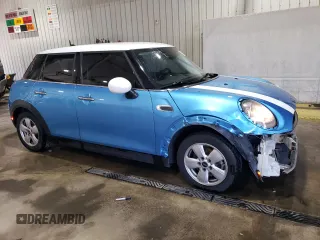 2017 MINI Hardtop 4 Door Cooper with VIN WMWXU1C58H2E17768, listed as a Copart auction lot 55128445 with 114,957 mi miles and Salvage Title. Bid and sale history available at DreamBid. Image 4.