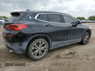 2019 BMW X2 sDrive28i with VIN WBXYJ3C52K5N14885, listed as a Copart auction lot 54079395 with 91,564 mi miles and Salvage title. Bid and sale history available at DreamBid. Image 3.