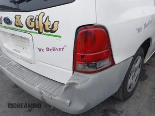 2004 Ford Freestar Cargo with VIN 2FTZA54674BB24626, listed as a IAAI auction lot 41243317 with 278,730 mi miles. Bid and sale history available at carsss.com. Image 6.