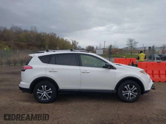 2018 Toyota RAV4 LE with VIN JTMBFREV8JJ722277, listed as a IAAI auction lot 42075684 with 203,458 mi miles and . Bid and sale history available at DreamBid. Image 13.