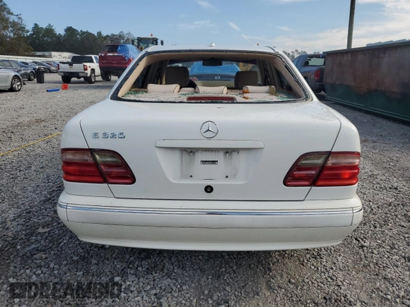 2002 Mercedes-Benz E-Class with VIN WDBJF65J12B434067, listed as a Copart auction lot 74250764 with 102,118 mi miles and Salvage Title. Bid and sale history available at carsss.com. Image 6.