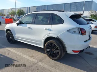 2013 Porsche Cayenne GTS with VIN WP1AD2A22DLA71143, listed as a IAAI auction lot 41287138 with 143,434 mi miles and . Bid and sale history available at DreamBid. Image 3.