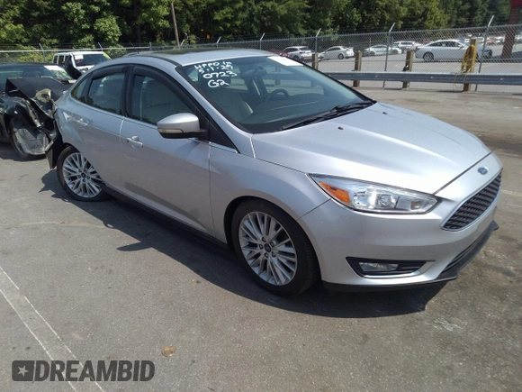 2018 Ford Focus Titanium with VIN 1FADP3J26JL280723, listed as a IAAI auction lot 42319900 with 149,583 mi miles and . Bid and sale history available at DreamBid. Image 1.