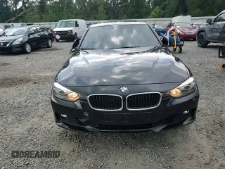 2013 BMW 3 Series 328i with VIN WBA3A5G57DNP25903, listed as a Copart auction lot 62056675 with 114,036 mi miles and Salvage title. Bid and sale history available at DreamBid. Image 13.