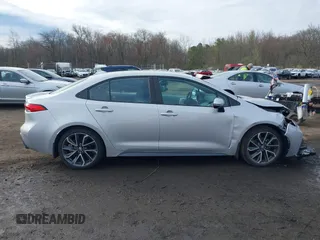 2022 Toyota Corolla SE with VIN 5YFS4MCE2NP108810, listed as a IAAI auction lot 41996376 with 45,701 mi miles and . Bid and sale history available at DreamBid. Image 13.