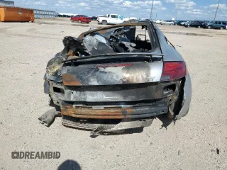 2008 Audi TT 2.0T z VIN TRUAF38JX81040924, wystawiony jako Copart lot #54509984 z przebiegiem Nie podano mil oraz Nie do naprawy • Non repairable. Historia ofert i sprzedaży dostępna na DreamBid. Obrazek 6.