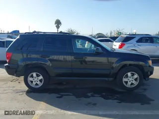 2005 Jeep Grand Cherokee Laredo with VIN 1J8GS48K95C615330, listed as a IAAI auction lot 41719101 with 152,186 mi miles. Bid and sale history available at carsss.com. Image 13.