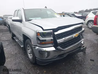 2018 Chevrolet Silverado 1500 LT with VIN 1GCVKREH6JZ360826, listed as a IAAI auction lot 41423923 with 158,170 mi miles. Bid and sale history available at carsss.com. Image 1.