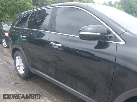 2017 Kia Sorento LX z VIN 5XYPG4A32HG265440, wystawiony jako IAAI lot #42480509 z przebiegiem 196 713 mil mil oraz . Historia ofert i sprzedaży dostępna na DreamBid. Obrazek 13.