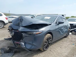 2020 Mazda 3 Premium with VIN JM1BPBNM3L1171285, listed as a IAAI auction lot 42097340 with 50,799 mi miles and . Bid and sale history available at DreamBid. Image 2.