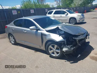 2014 Kia Optima LX with VIN KNAGM4A73E5490687, listed as a IAAI auction lot 39446420 with 89,492 mi miles and . Bid and sale history available at DreamBid. Image 1.