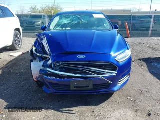 2016 Ford Fusion S z VIN 1FA6P0G73G5125666, wystawiony jako IAAI lot #41973151 z przebiegiem 100 851 mil mil oraz . Historia ofert i sprzedaży dostępna na DreamBid. Obrazek 6.