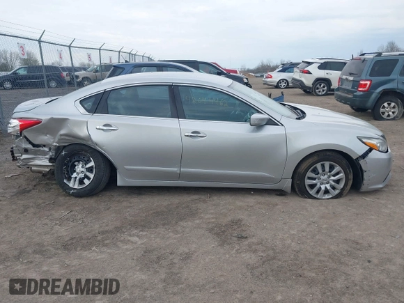 2016 Nissan Altima S z VIN 1N4AL3APXGN331521, wystawiony jako IAAI lot #42044462 z przebiegiem 119 130 mil mil oraz . Historia ofert i sprzedaży dostępna na DreamBid. Obrazek 13.