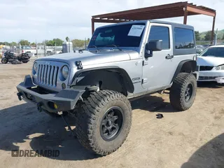 2014 Jeep Wrangler Sport with VIN 1C4AJWAG5EL206565, listed as a IAAI auction lot 42015000 with 90,129 mi miles and . Bid and sale history available at carsss.com. Image 17.