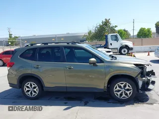 2022 Subaru Forester Premium z VIN JF2SKAEC2NH431414, wystawiony jako IAAI lot #42404661 z przebiegiem 51 516 mil mil oraz . Historia ofert i sprzedaży dostępna na DreamBid. Obrazek 14.