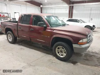 2001 Dodge Dakota Sport with VIN 1B7GG2AN71S209614, listed as a IAAI auction lot 42066349 with 242,675 mi miles. Bid and sale history available at carsss.com. Image 1.