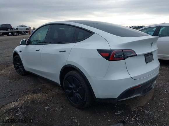 2024 Tesla Model Y with VIN 7SAYGDED5RA333553, listed as a IAAI auction lot 40809117 with NaN miles. Bid and sale history available at carsss.com. Image 3.