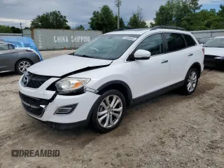 2011 Mazda CX-9 Grand Touring z VIN JM3TB2DA3B0301927, wystawiony jako Copart lot #56886665 z przebiegiem 142 536 mil mil oraz Szkoda całkowita • Salvage title. Historia ofert i sprzedaży dostępna na DreamBid. Obrazek 1.