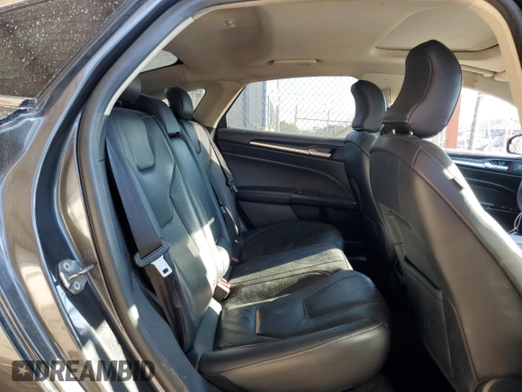 2018 Ford Fusion Titanium с VIN 3FA6P0D92JR192382, выставлен на аукционе Copart как лот 74065774 с пробегом 110 411 миль миль и Списание • Salvage title. История ставок и продаж доступна на DreamBid. Изображение 10.