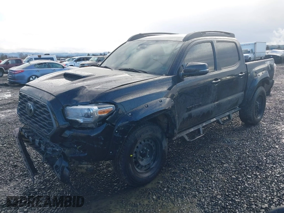 2020 Toyota Tacoma SR5 z VIN 5TFCZ5AN9LX216032, wystawiony jako IAAI lot #41448197 z przebiegiem 128 581 mil mil oraz . Historia ofert i sprzedaży dostępna na DreamBid. Obrazek 2.