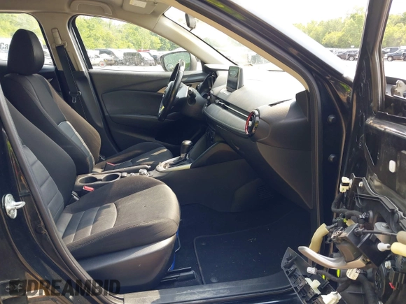 2016 Mazda CX-3 Touring z VIN JM1DKBC75G0114621, wystawiony jako IAAI lot #42389111 z przebiegiem 161 503 mil mil oraz . Historia ofert i sprzedaży dostępna na DreamBid. Obrazek 5.