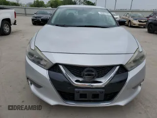 2017 Nissan Maxima S с VIN 1N4AA6AP8HC404521, выставлен на аукционе Copart как лот 50867305 с пробегом 117 312 миль миль и Списание • Salvage title. История ставок и продаж доступна на DreamBid. Изображение 5.