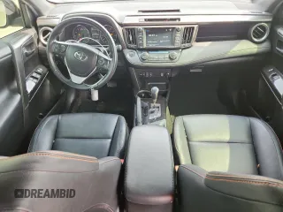 2016 Toyota RAV4 SE z VIN JTMJFREV0GD177498, wystawiony jako Copart lot #60571225 z przebiegiem 88 396 mil mil oraz Szkoda całkowita • Salvage title. Historia ofert i sprzedaży dostępna na DreamBid. Obrazek 8.