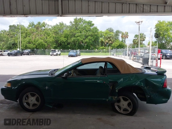 2001 Ford Mustang Deluxe z VIN 1FAFP44441F198354, wystawiony jako IAAI lot #42433701 z przebiegiem 69 328 mil mil oraz . Historia ofert i sprzedaży dostępna na DreamBid. Obrazek 14.