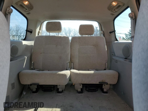 2005 Kia Sedona LX with VIN KNDUP132056685525, listed as a Copart auction lot 77790354 with 60,985 mi miles and Salvage Title. Bid and sale history available at carsss.com. Image 10.